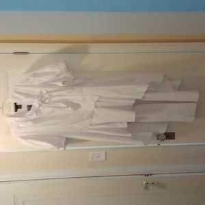 High/low casual white shirt by Ashley Stewart. Size 18 runs big.